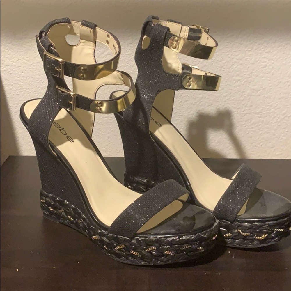Bebe Black Wedges with gold accents